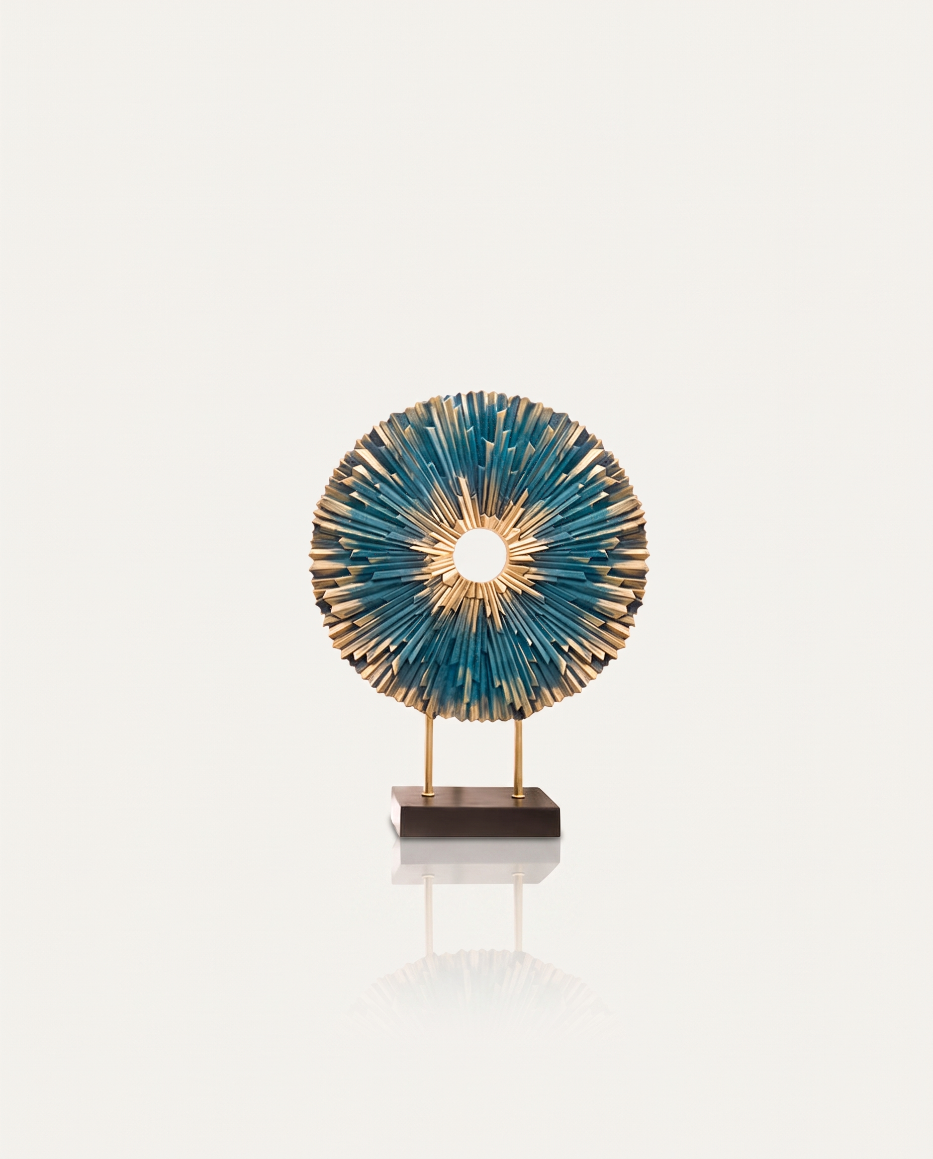 Blue and gold sunburst sculpture