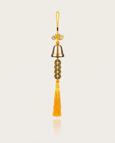 Brass bell with five emperor coins, yellow tassel