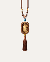 Guan Gong carved boxwood hanging charm with beads and tassel, studio photo