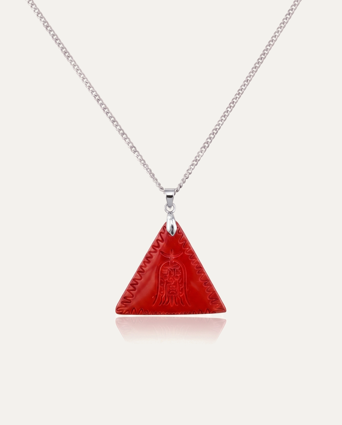 Red Amitabha Triangle Cinnabar Pendant on silver chain, ivory background
