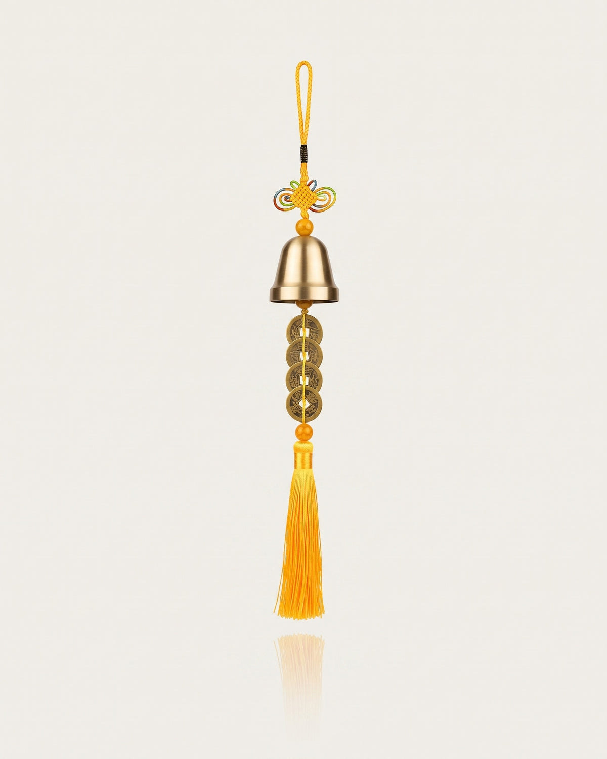 Brass bell with five emperor coins, yellow tassel