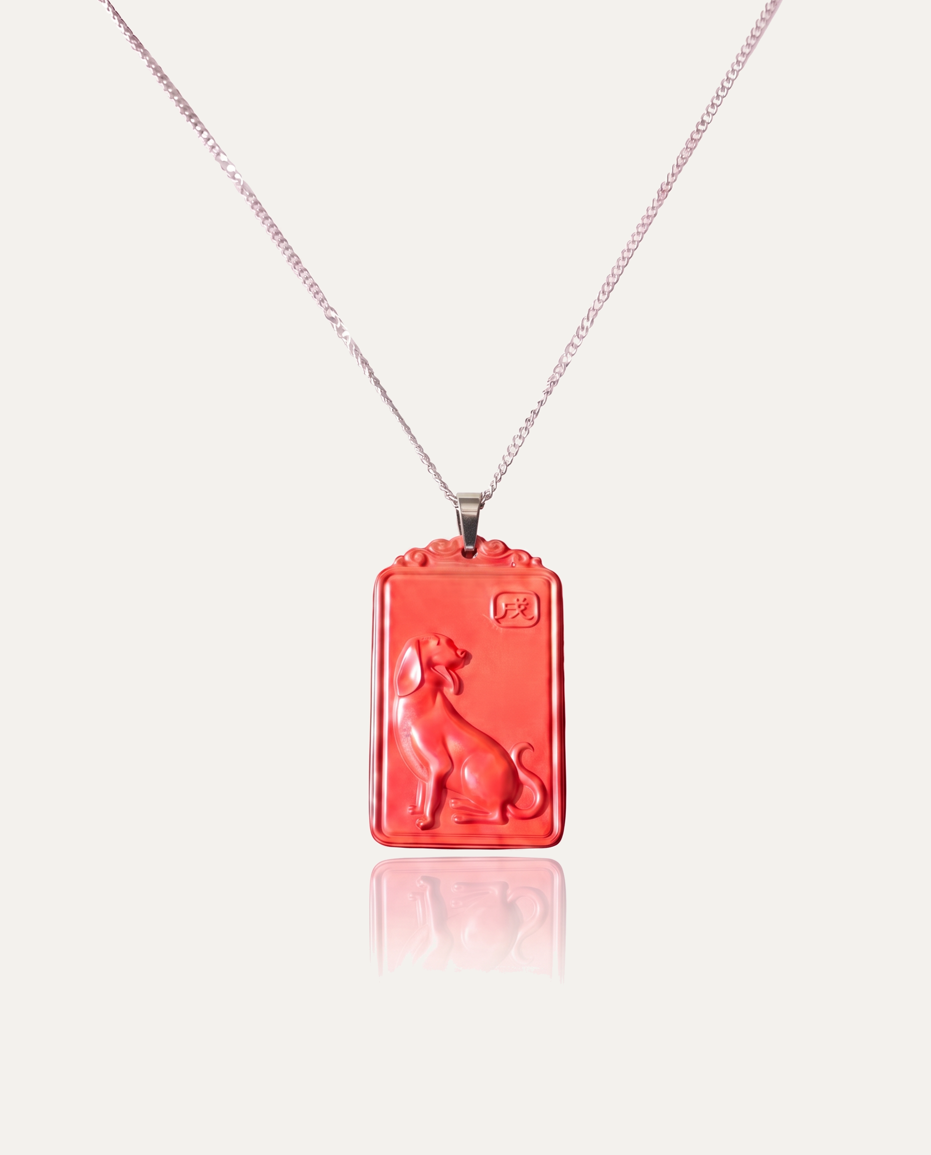 Dog zodiac cinnabar pendant necklace silver chain on ivory background
