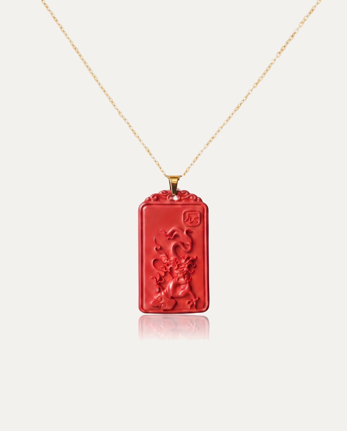 Dragon zodiac cinnabar pendant necklace gold chain on ivory background