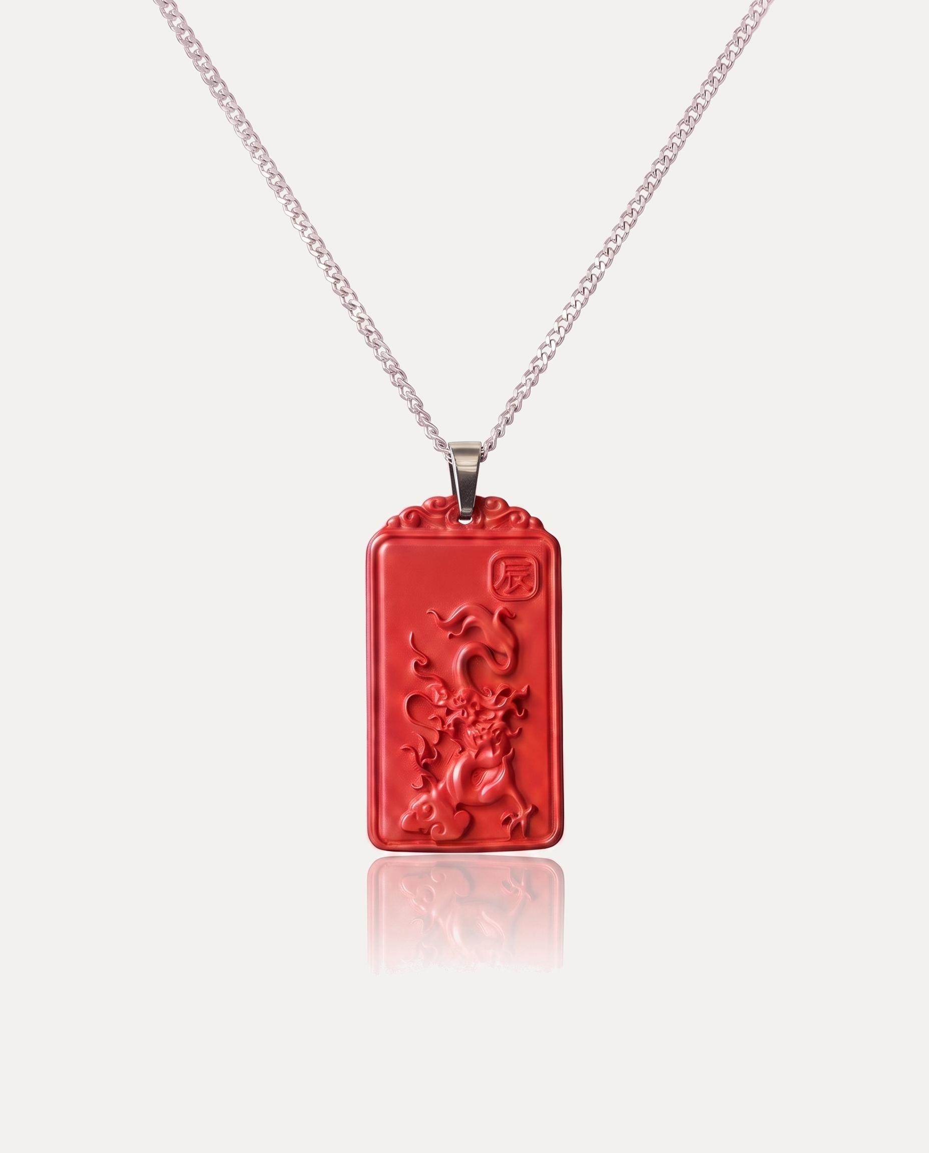 Dragon zodiac cinnabar pendant necklace silver chain on ivory background