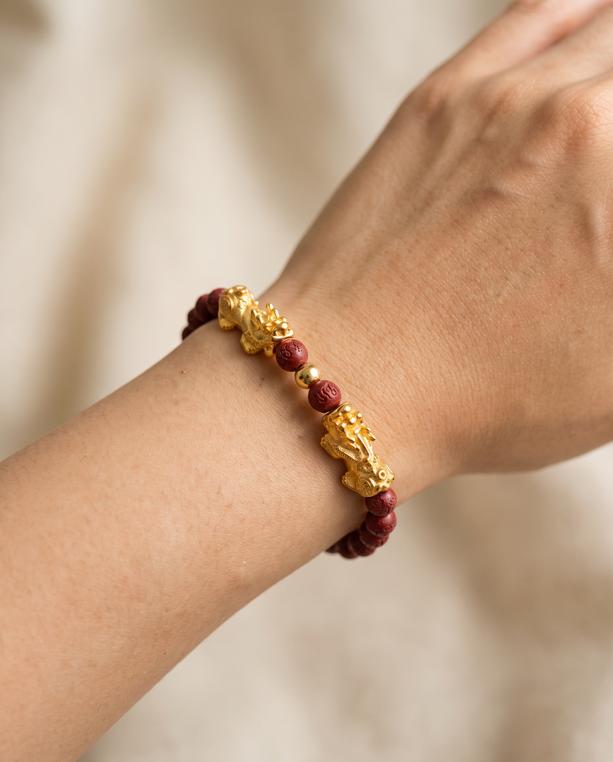 Fortune Charm Mini Pixiu Red Cinnabar Bracelet worn on wrist