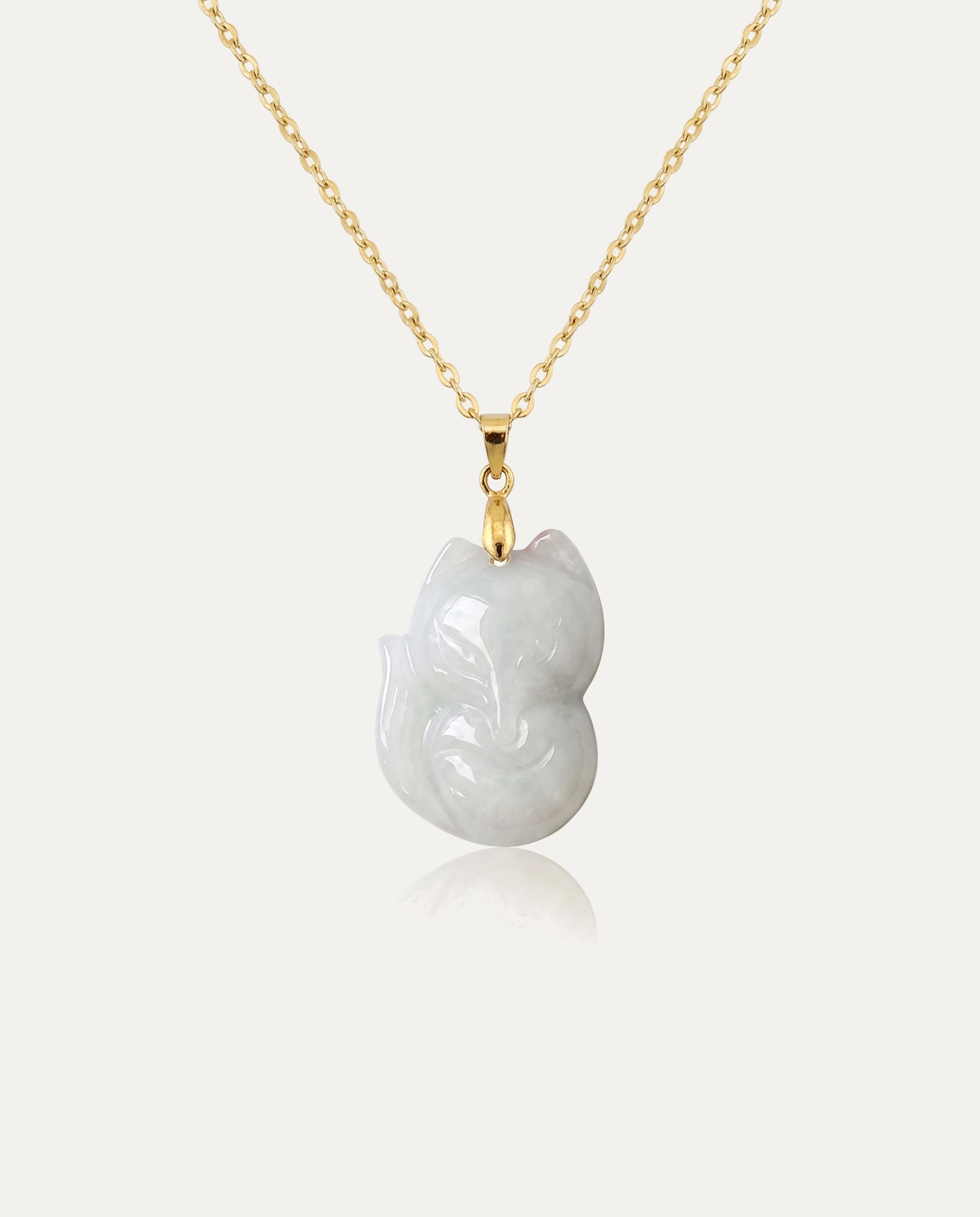 Jade fox necklace light gold on ivory background