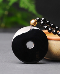 Twin Pixiu obsidian pendant back with beaded cord