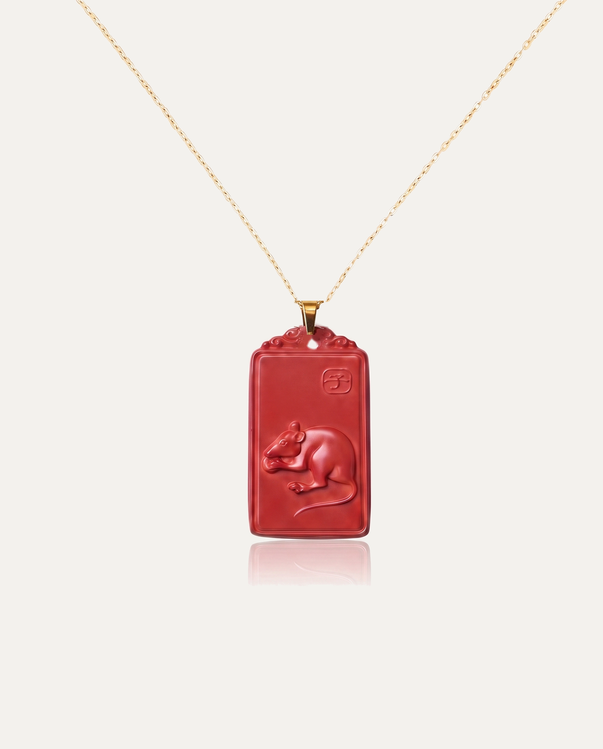 Rat zodiac cinnabar pendant necklace gold chain on ivory background