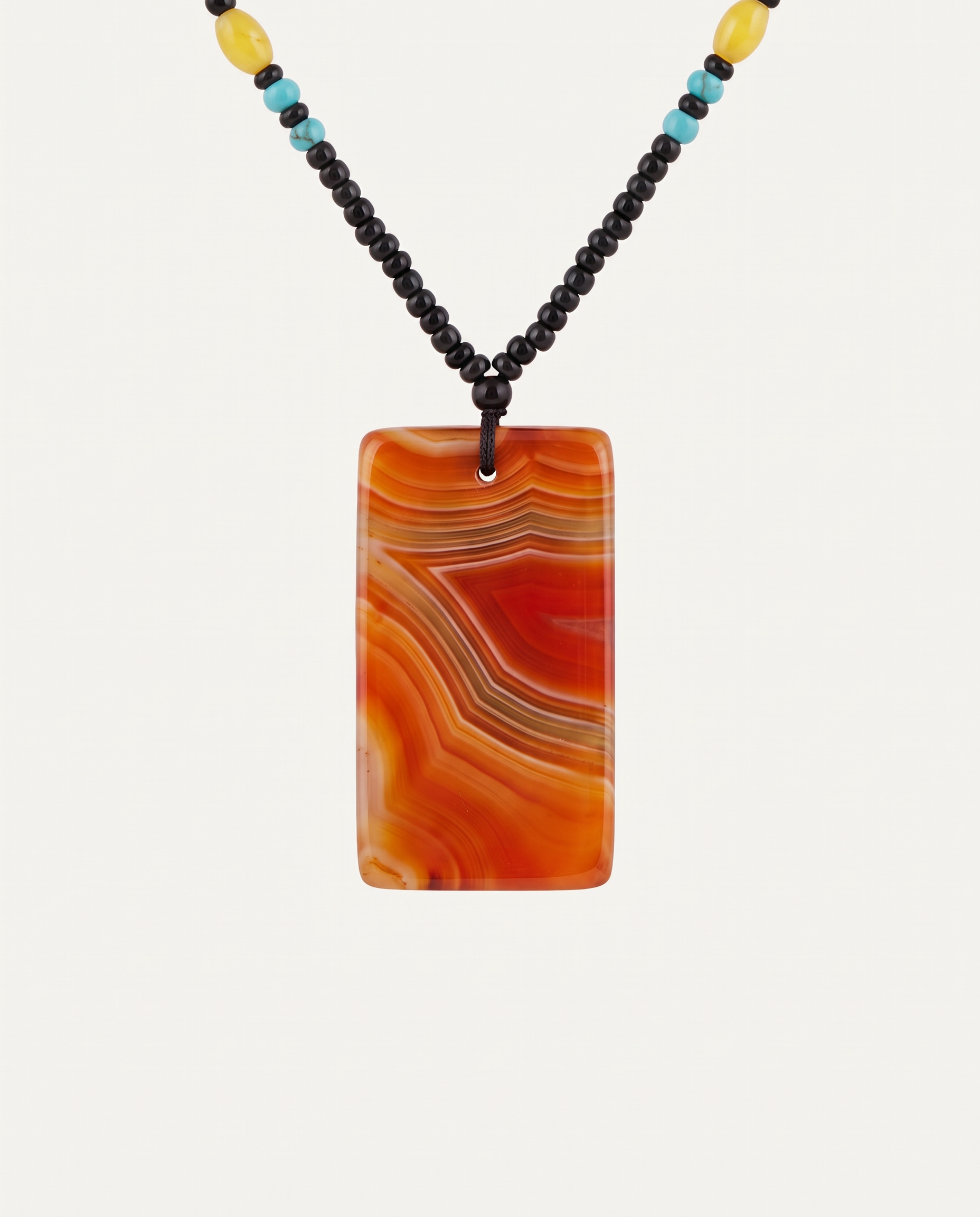 Red Agate Tablet Necklace on black seed bead strand, studio photo
