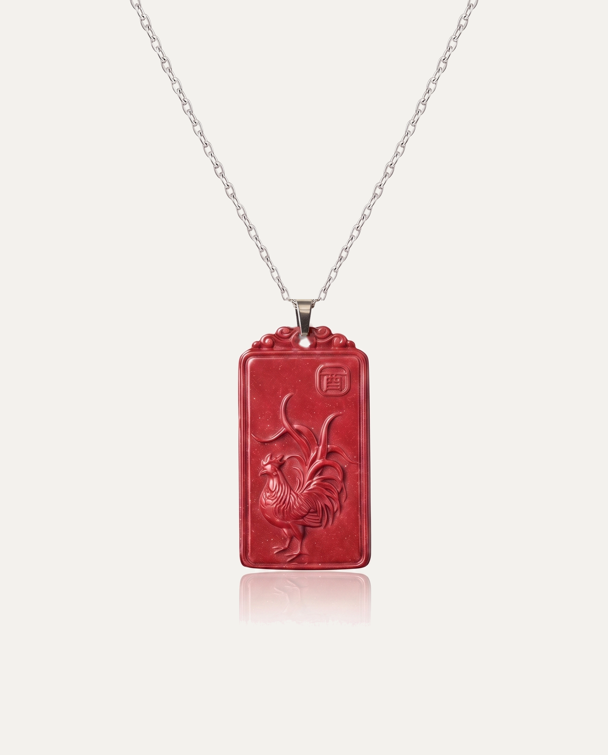 Rooster zodiac cinnabar pendant necklace silver chain on ivory background