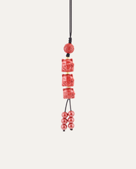 Three Lucky Cats Cinnabar Hanging Charm, studio photo