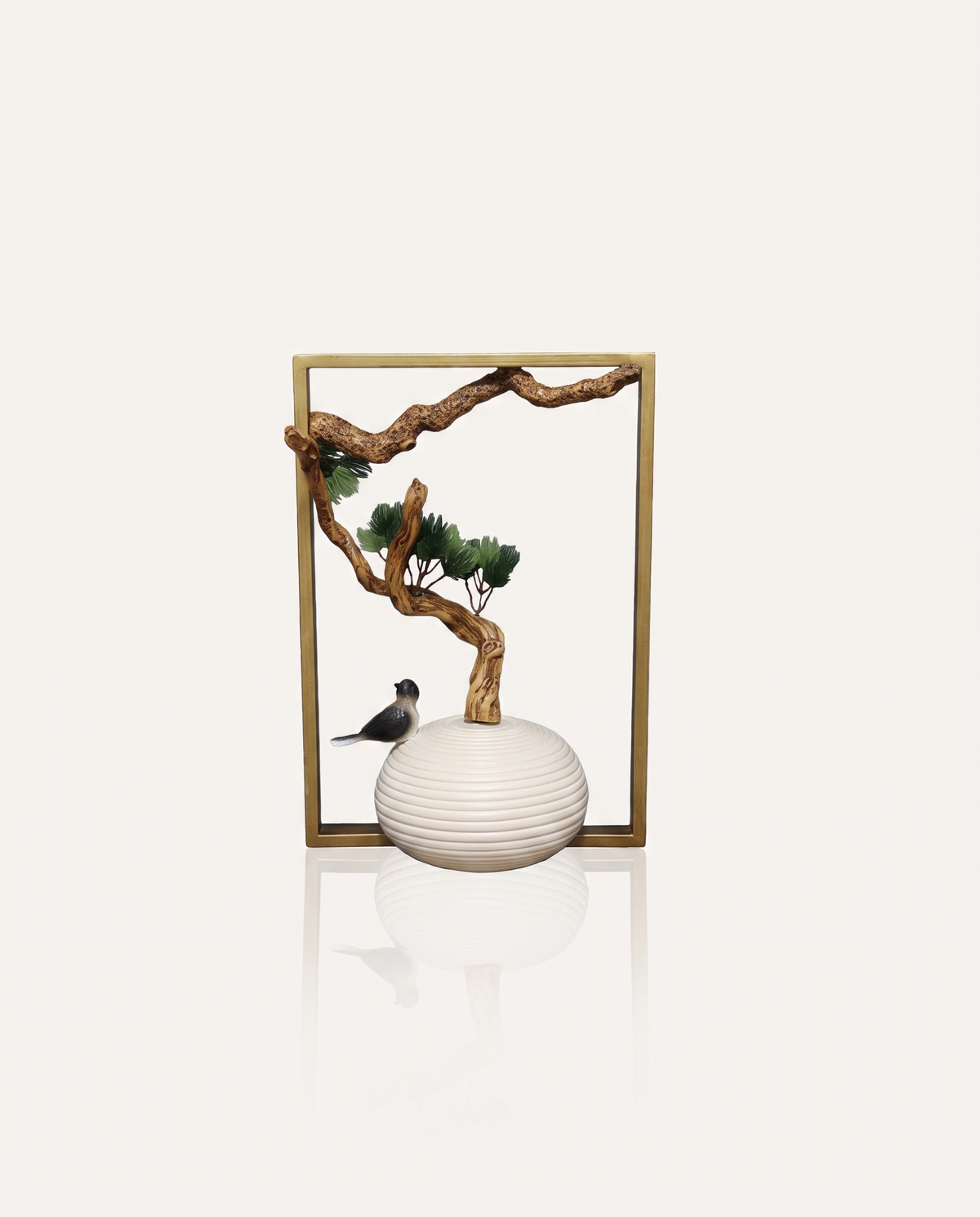 Two birds on a pine branch sculpture
